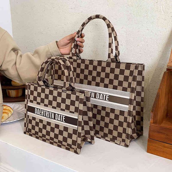 

2022 factory wholesale new popular checkerboard portable tote bag high-capacity letter fashion commuter women's hand carrying armpit ba