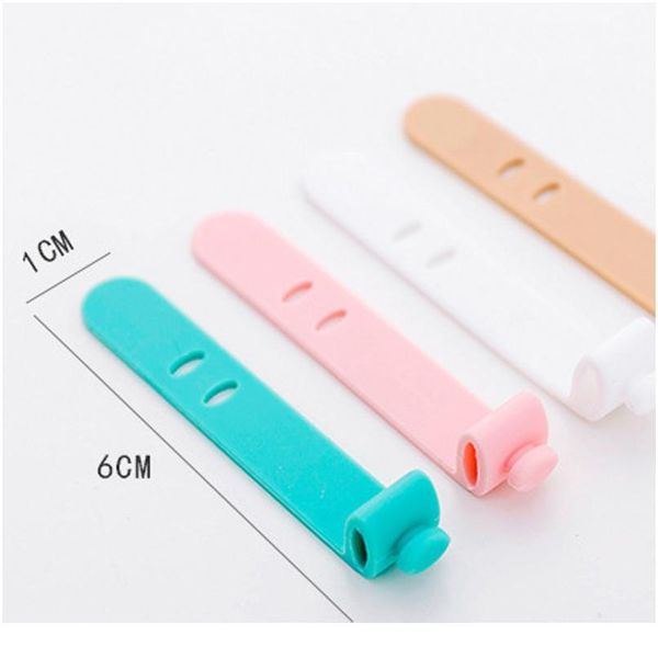 

4 pcs/lot multipurpose deskphone cable winder earphone clip charger organizer management wire cord fixer sil jllddr