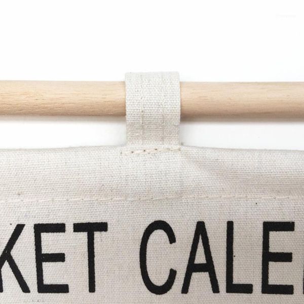 

storage space saving mini pocket office white home organizer calendar indoor cotton linen hanging bag lightweight wall decor1