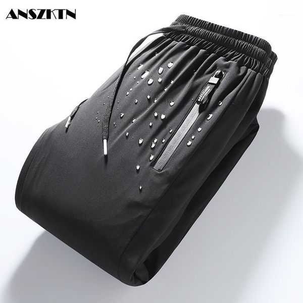 

anszktn down pants winter thickening warm wind-proof white duck down foot pants over the cold sweatpants padded trousers1, Black