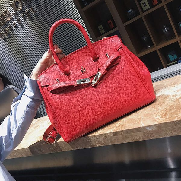 

2020 fashion new women's bride's wedding litchi pattern one shoulder slant cross designers hand tote leather mini women bags