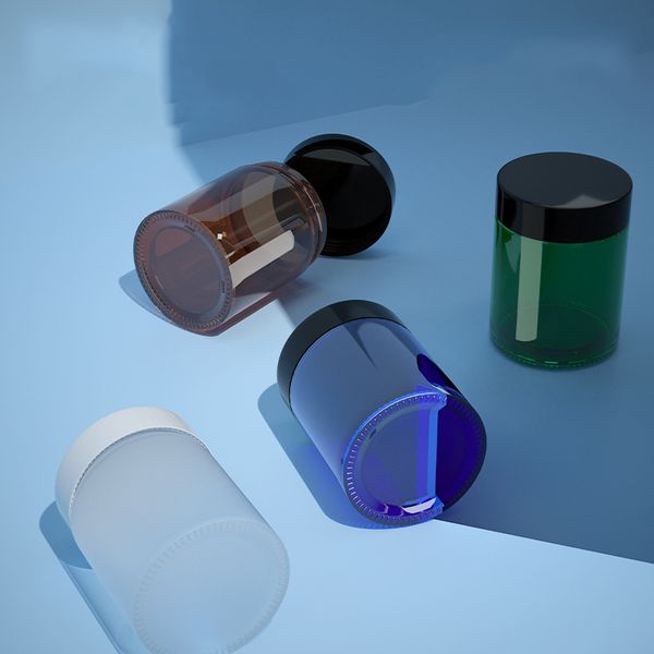 

amber blue frosted clear green glass jars cosmetic jars cream with black plastic lids pp liner 100g lip balm cream containers
