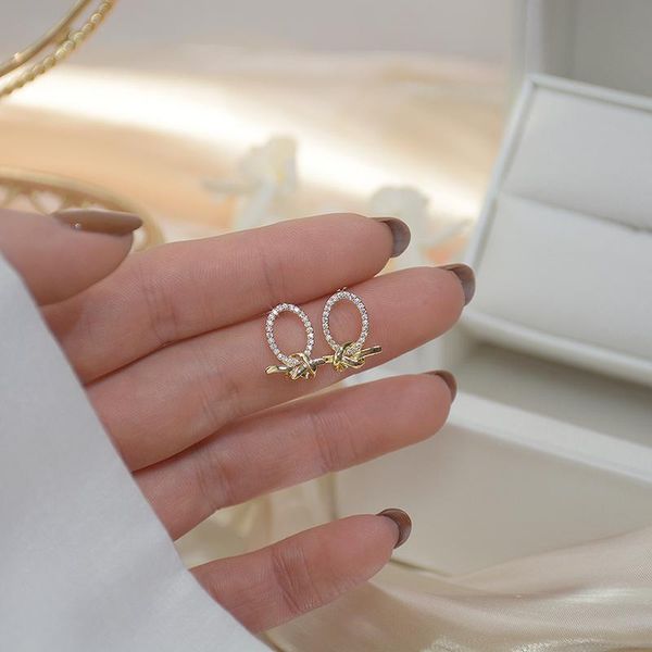 

stud qx-eh025 korean style exquisite inlaid zircon bowknot design ladies earrings, Golden;silver