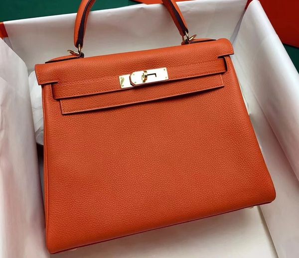 

whosale half handmade 28cm orange blue togo leather design purse wax thread have both gold and silver hardwarecontact me for