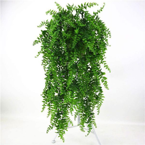 

искусственные листья пластиковые зеленые растения стены стены висит дома сад живущая комната клуб бар украшенный поддельными листьями зелены