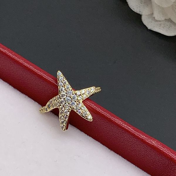 

high end exquisite and small gold full diamond starfish ear clip earrings, Silver
