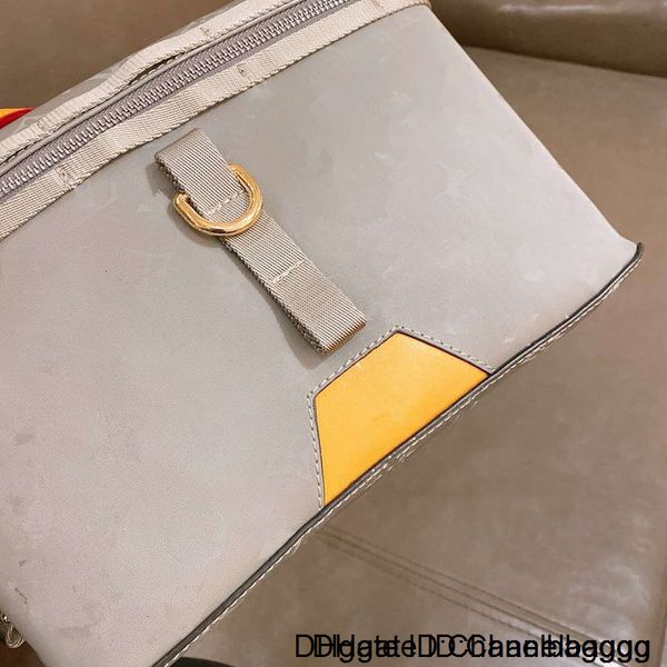 

new 2020 ms messenger inclined genuine leather handbag silver laser single shoulder bag bucket woman purses the designer handbags