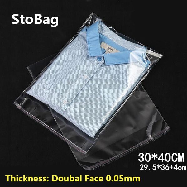 Stobag 100 pcs 30 * 40cm transparente auto adesivo OPP RESOLEGIDO POLY CELLOPHANE sacos de roupa de embalagem claro Y1202