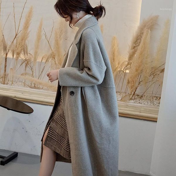 

2019 autumn and winter new warm and simple mid-length coat black large lapel cashmere wool blend trench coat loose large size1