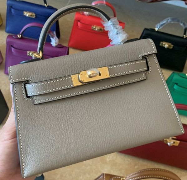 

whosale handmade 19cm etaupe lamb skin design mini purse,wax thread have both gold and silver hardware,contact me for details
