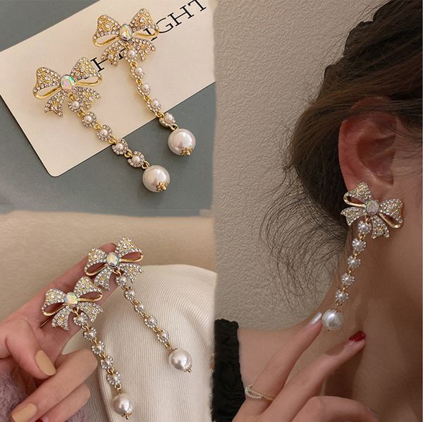 

2021 new fashion women long pearls wedding drop earrings butterfly crystals dangle earrings jewelry for girls gift prom evening party events, White