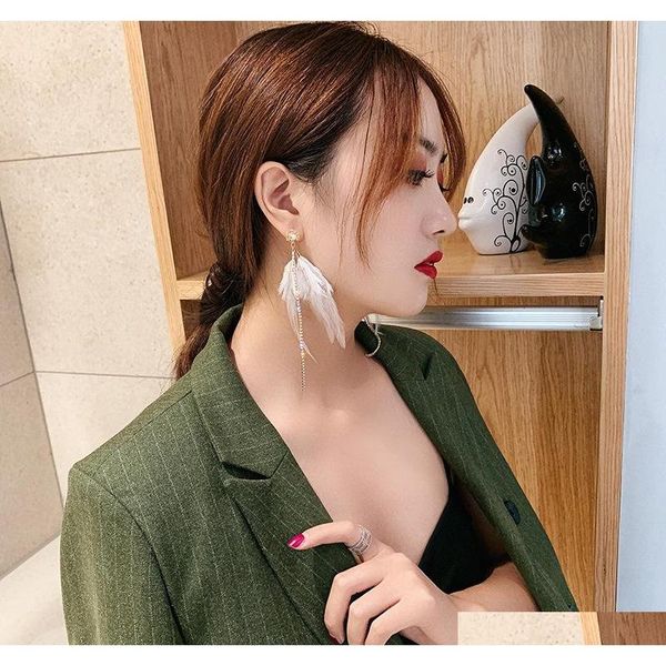 

s947 fashion jewelry s925 silver needle feather earrings rhisntone cross long tassel da sqcina homes2007