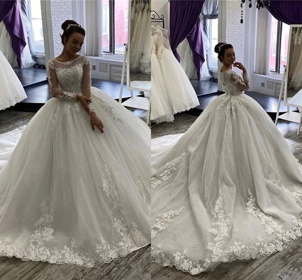 

ball gown wedding dresses sheer neck long sleeves 2021 arabic aso ebi bridal gowns lace appliqued beaded formal plus size vestidos al7673, White