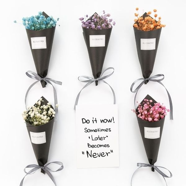 

small fresh starry handmade dried flowers gifts shooting props christmas holiday gift bouquet with hands ceremony