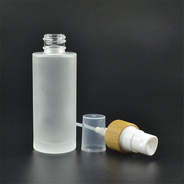 

70pcs* 100ml frost glass bottle with bamboo lotion pump emulsion pump bottles empty cosmetic packaging glass mist spray bottle