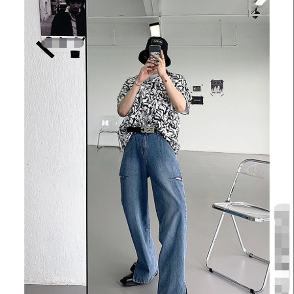 

2021 new pair of torn cut jeans that are very elegant man in xtgt, Blue