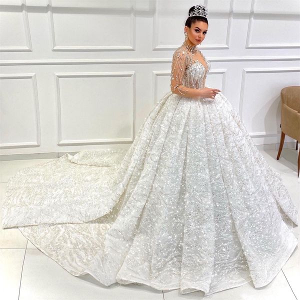 

dubai luxurious ball gown glittering wedding dresses sequin bridal gowns 2022 sheer long sleeve buttons lace up vestido de novia, White