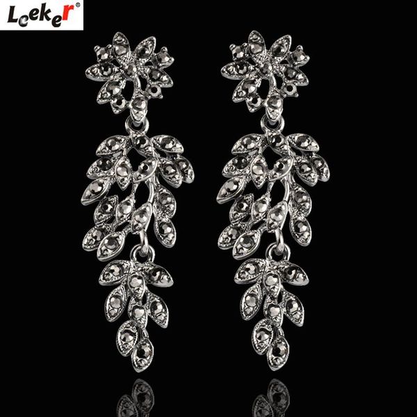 

левки женщины сексуальные вечеринки ювелирные изделия большие полые серьги листьев болтаться для женщин с черным кубическим цирконием 073 lk, Silver