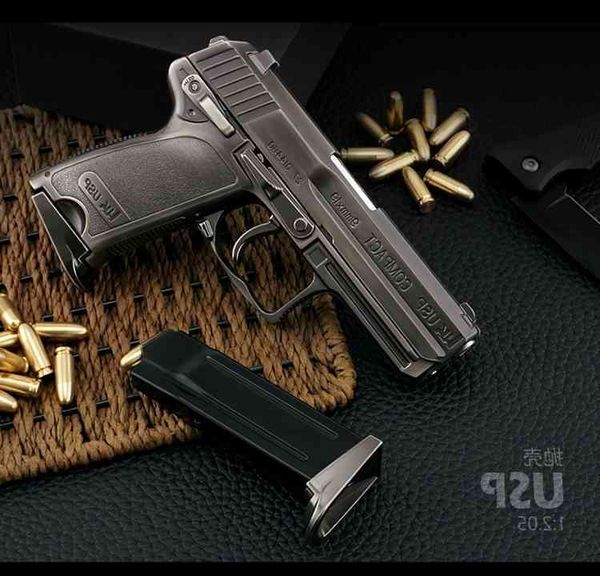 

541: 2.05 shell throwing usp hand grab model all metal simulation toy detachable assembly can not fire boy gun