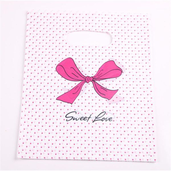 

gift wrap design wholesale 100pcs/lot 20*25cm pink sweet love packaging bags for t-shirt plastic shopping with dot bow1