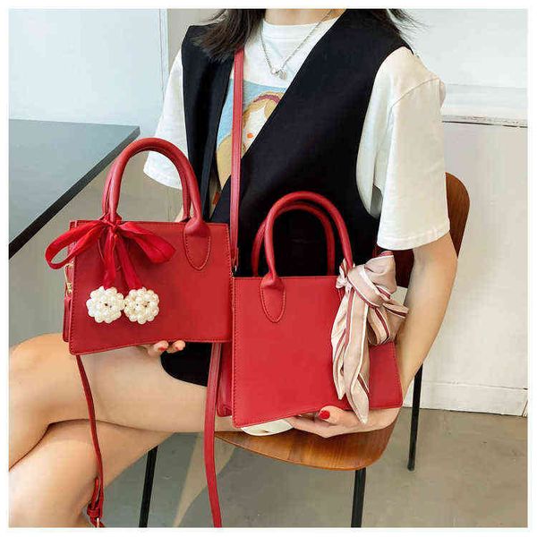 

nxy handbag bridal bag 2022 spring new women s korean version foreign style portable small square fashion one shoulder messenger 0211