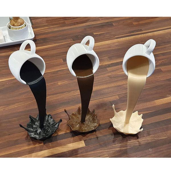 

floating spilling coffee cup sculpture kitchen decor spilling magic pouring splash