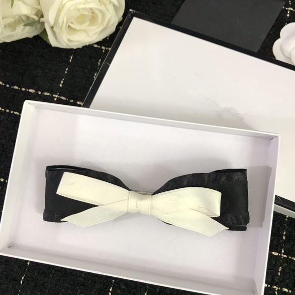 

2021 new high-end temperament socialite style bow lady sweet atmosphere double large bow white hairpin