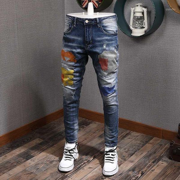 

newly fashion designer slim fit retro blue ripped denim pants streetwear patches hip hop men jeans1