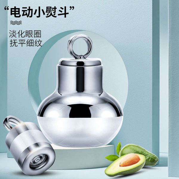 

huarong source small ironing bullfight oil cream to black eye essence infrared electric massage apparatus