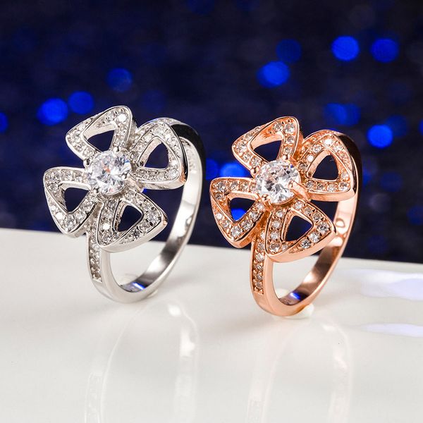 

s925 sterling silver four-flower ring european and american hollowed-out full diamond flower small flower light luxury, Golden;silver