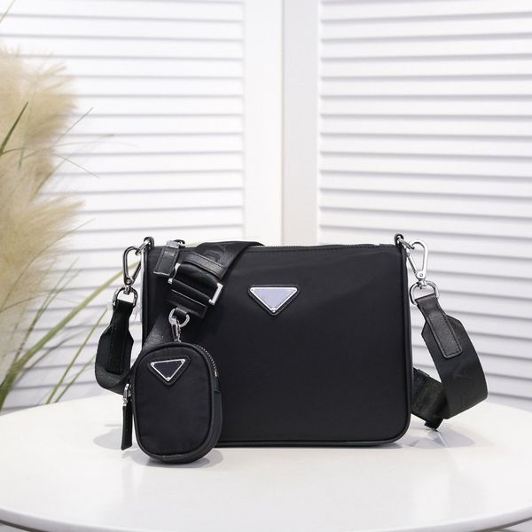 

the shoulder bags strap also has a small pendant that can be used as an accessory for other bags and trousers