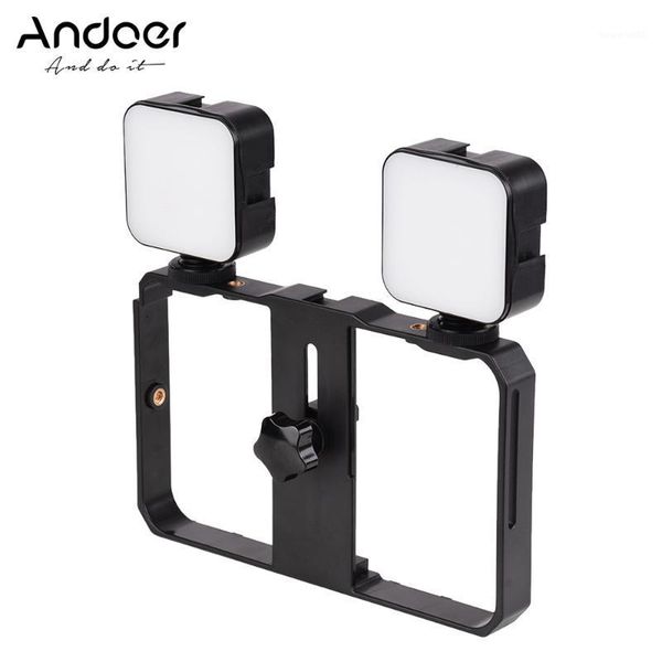 

andoer mini led video light 5w pgraphy fill-in lamp 6500k dimmable with phone holder 3 cold shoe mounts for pgraphy1
