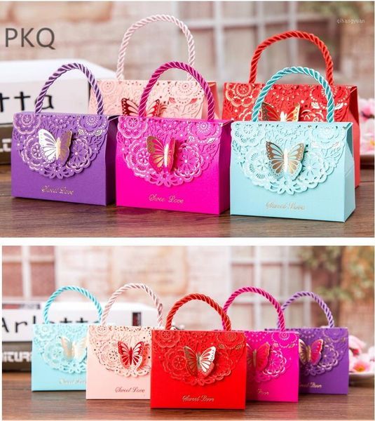 

30pcs paper cutting candy box wedding hollow butterfly gift boxes for guests party favors present bags with handle1