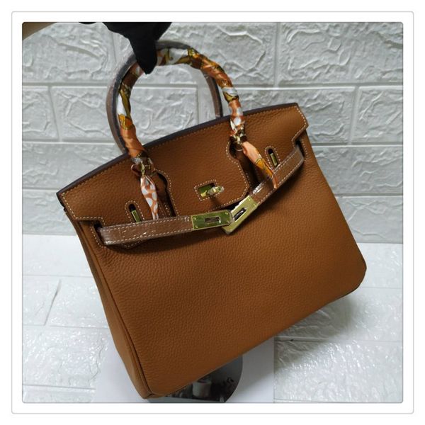 

new style fashion head leather hand-held women's lock bag earth yellow