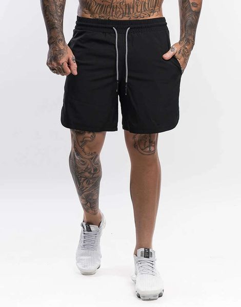 

2020 new men's sports shorts woven fast dry beach fitness basketball training loose jogging solid color pants