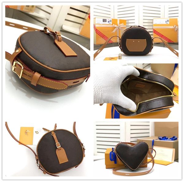 

coeur's handbag is made of monogram canvas. a red heart is spotted in the upper left corner to set off the heart-shaped contour
