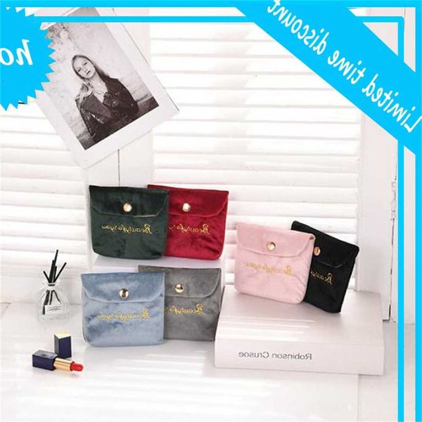 

dhl100pcs women velet letter embroidery hasp storage cosmetic bag mix color
