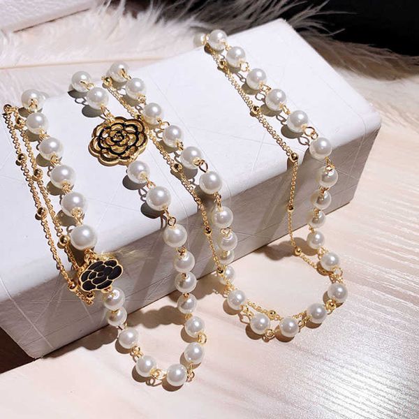 

luxury hollow camellia pearl pendant flower sweater chain necklace for woman, Silver