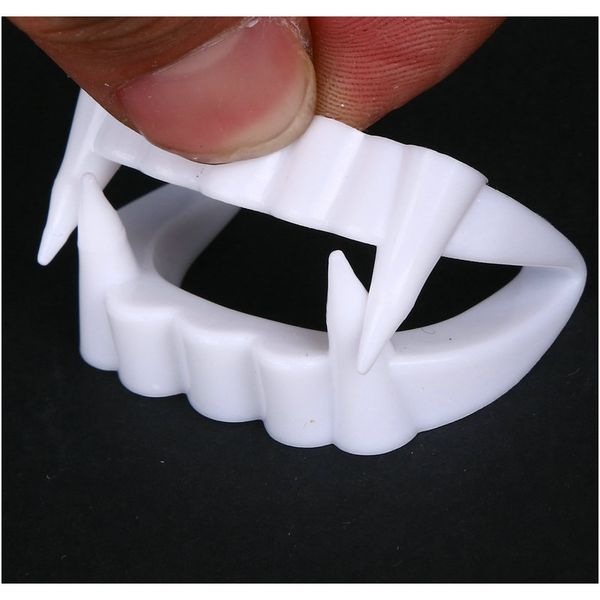 

1 шт. новая игрушка вампир поддельных зубов для хэллоуина party prop masquerade косплей макияж смешные зубные протезы бесплатная доставка sq