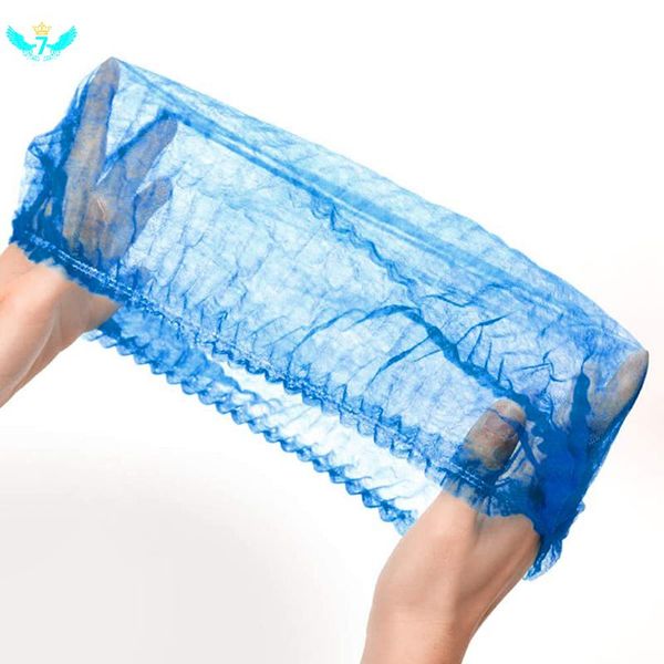

reinforced 50 pcs/pack 21-inch disposable non-woven fabric shower cap double strip cap dustproof headgear for bathroom
