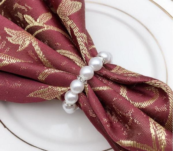 Anelli di tovagliolo di perle bianche Fibbia di tovagliolo di nozze per ricevimenti di nozze Forniture per decorazioni da tavola per feste all'ingrosso