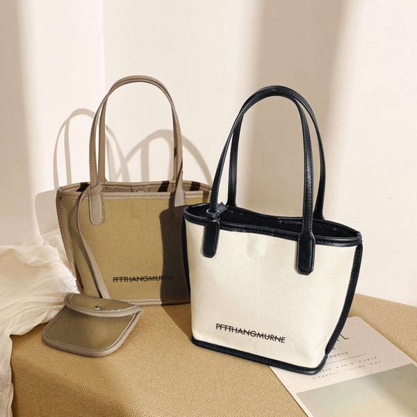 

fashion large capacity advanced sense commuting tote women's 2021 new fashion portable one shoulder canvas bag