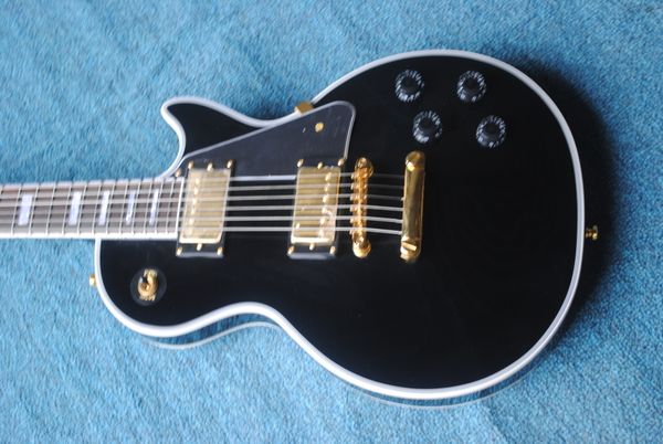 

delivery, black electric guitar, gold hardware, rosewood fingerboard , color can be customized