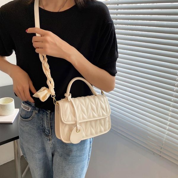 

female wheat texture 2021 portable solid color bag small new car messenger shoulder square foreign trade ear stitching rigih