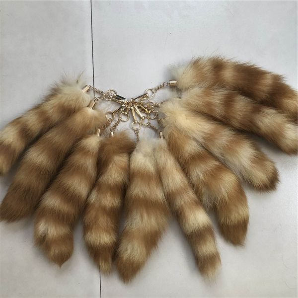 10 pçs / lote -25cm-30 cm Real American Raccoon Fur Cauda Keychain Cosplay Brinquedos Bolsa Bolsa Pingente