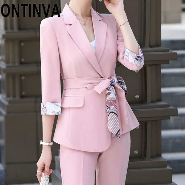 Taglie forti 5XL 4XL S M Blazer dal design irregolare rosa con stampa tascabile Cintura in vita floreale Cintura autunno inverno Giacca elegante 210527