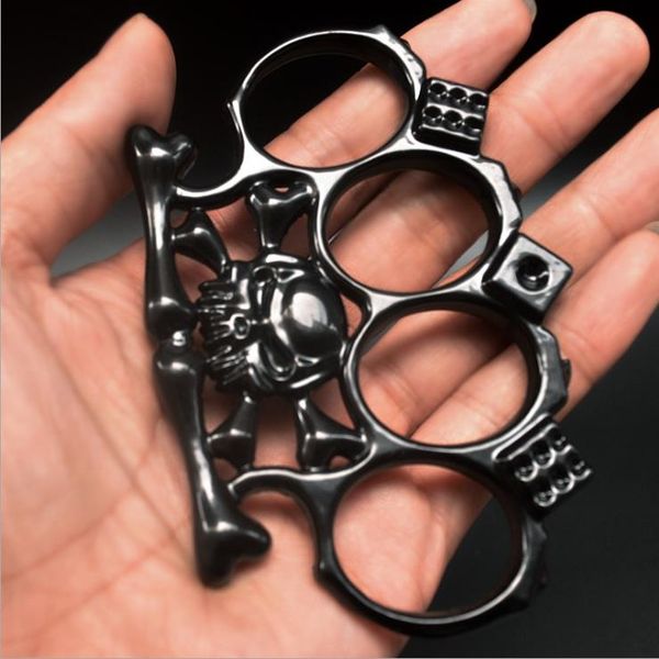 

skull hand clasp fist clasp tiger finger glove legal self-defense weapon iron four-finger tiger martial arts fighter brace ring