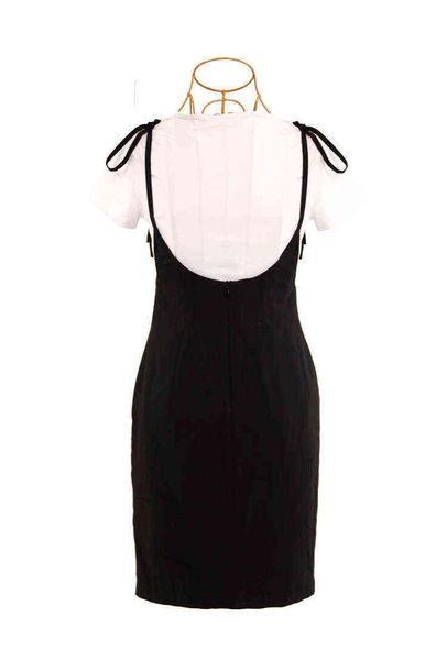 

white xu lu's short sleeve t-shirt with black slim sling and a-line dress suit