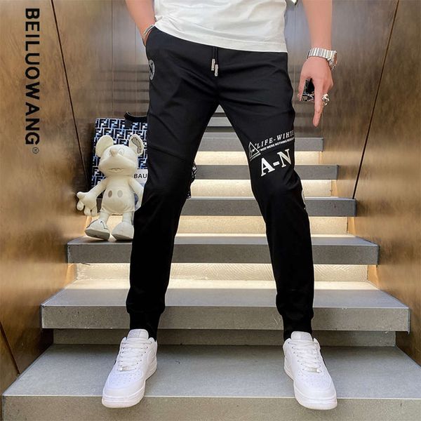 

langyi clothing 2021 spring and summer new men's european casual pants men's loose binding print knitted pants men's fashion, White;black