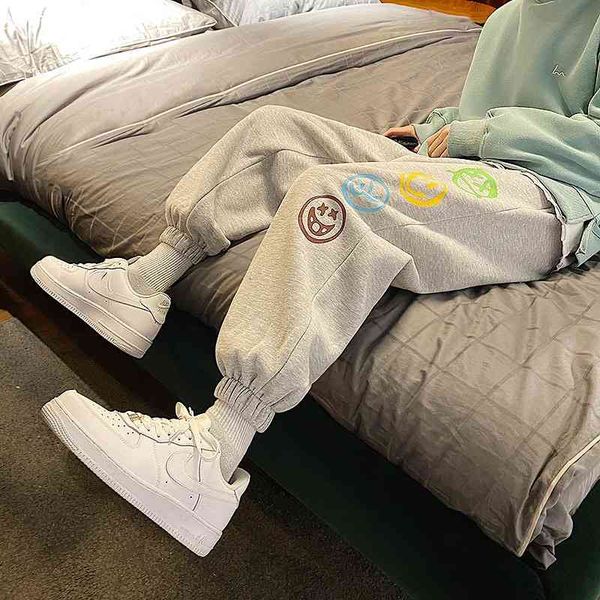 

pants men's korean loose legged hip hop sports winter fashion brand plush warm smiling face guard pants, Black